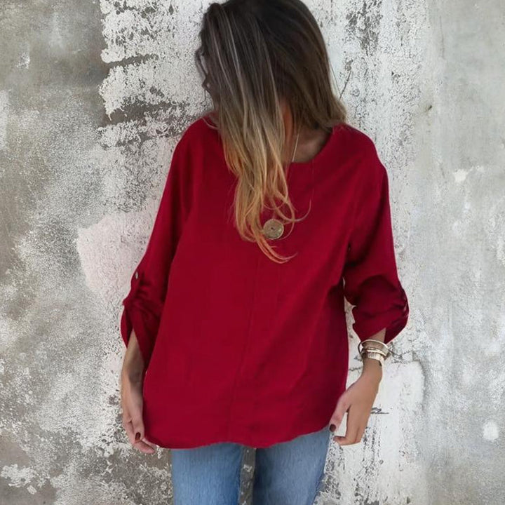 Vrouwenblouse in relaxed model met opgestroopte mouwen